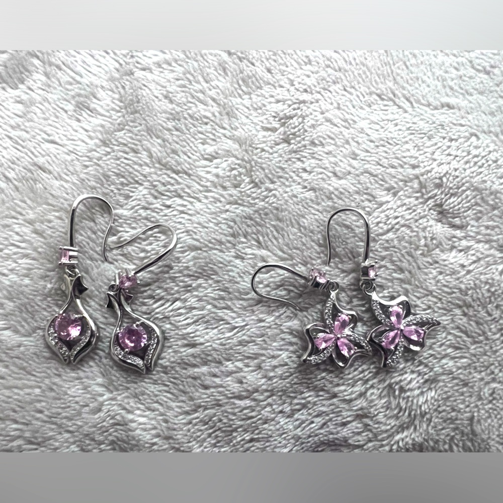 Two pairs of light pink earrings